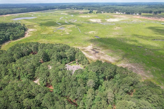1064 Tresses Ct, Vass, NC 28394 - aerial overview of property's location with a nearby body of water and a heavily wooded area