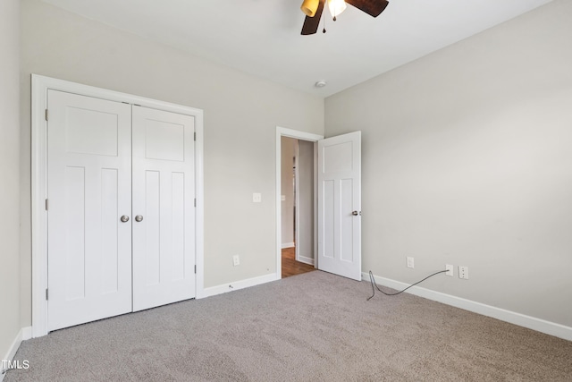 24 Windchime Ct, Clayton, NC 27527 - unfurnished bedroom featuring carpet floors, a closet, and a ceiling fan