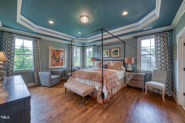 633 Rolling Springs Dr, Cary, NC 27519 - bedroom with crown molding, a raised ceiling, wood finished floors, and recessed lighting