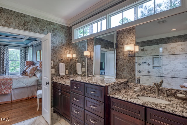 633 Rolling Springs Dr, Cary, NC 27519 - ensuite bathroom with plenty of natural light, vanity, crown molding, and walk in shower