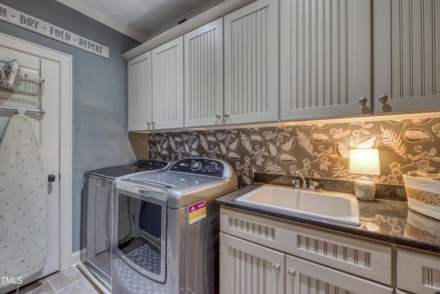 633 Rolling Springs Dr, Cary, NC 27519 - laundry area featuring cabinet space, independent washer and dryer, and crown molding