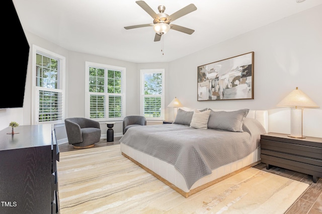 119 Florentino Ct, Clayton, NC 27527 - bedroom featuring wood finished floors and a ceiling fan
