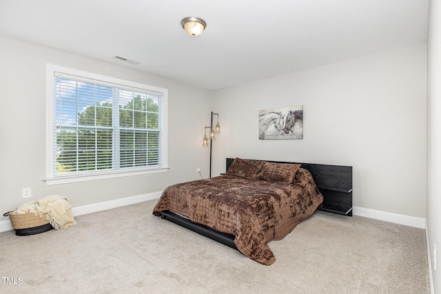 119 Florentino Ct, Clayton, NC 27527 - carpeted bedroom featuring baseboards
