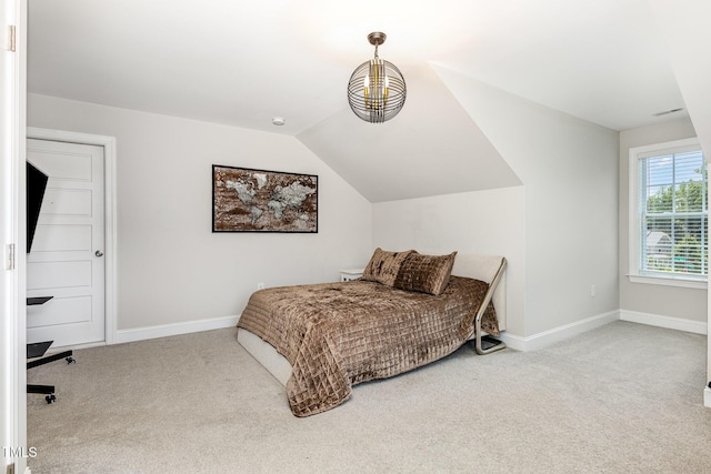 119 Florentino Ct, Clayton, NC 27527 - carpeted bedroom with baseboards and vaulted ceiling