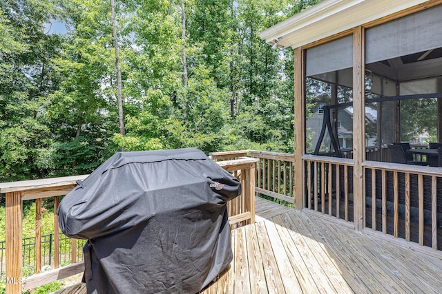 119 Florentino Ct, Clayton, NC 27527 - wooden deck featuring a sunroom and grilling area