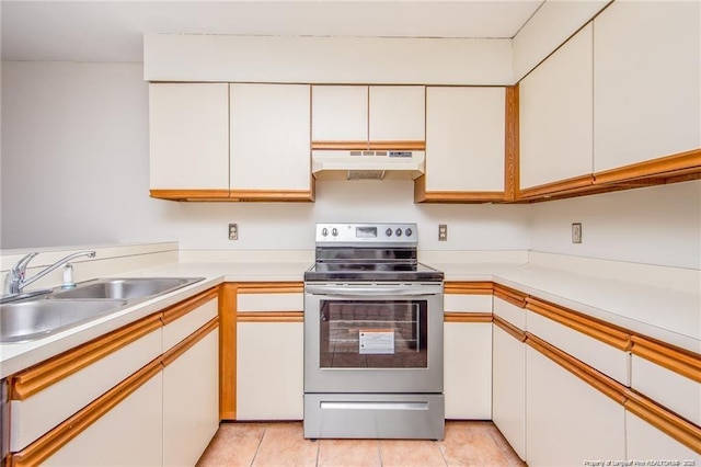 400 Cypress Trace Dr, Fayetteville, NC 28314 - kitchen featuring stainless steel electric range oven, under cabinet range hood, white cabinets, and light countertops