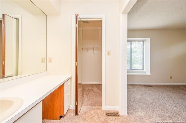 400 Cypress Trace Dr, Fayetteville, NC 28314 - bathroom with vanity and a textured ceiling