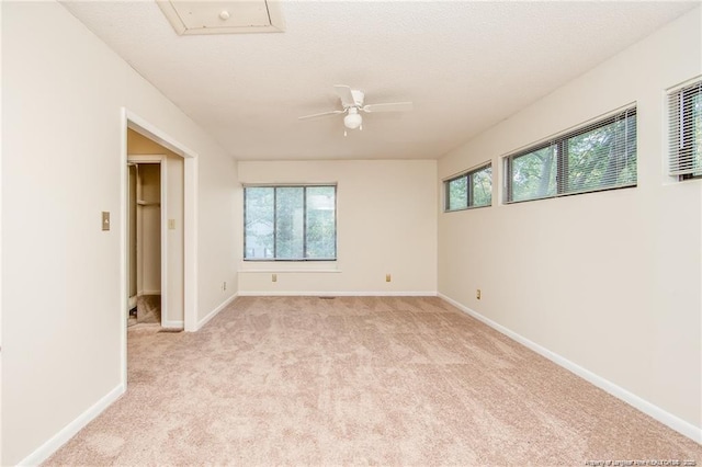 400 Cypress Trace Dr, Fayetteville, NC 28314 - spare room featuring plenty of natural light, light carpet, a ceiling fan, and attic access