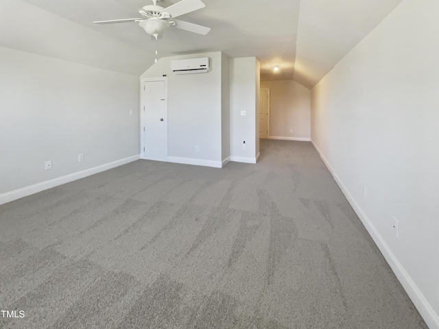 1092 Adams Point Dr, Garner, NC 27529 - additional living space with a wall unit AC, lofted ceiling, ceiling fan, and carpet floors