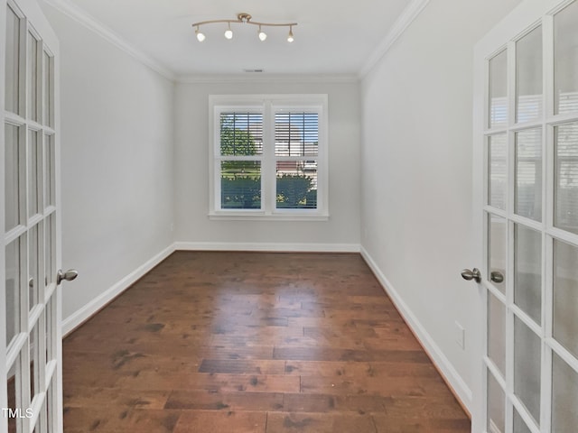 1092 Adams Point Dr, Garner, NC 27529 - unfurnished room featuring french doors, wood finished floors, and ornamental molding