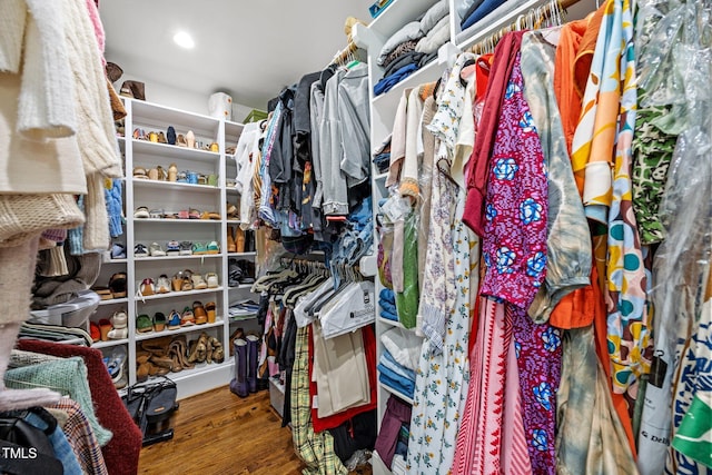 227 W Drewry Ln, Raleigh, NC 27609 - walk in closet featuring wood finished floors
