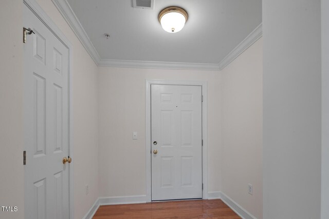 108-203 Northbrook Dr Unit 203, Raleigh, NC 27609 - foyer entrance featuring wood finished floors and crown molding