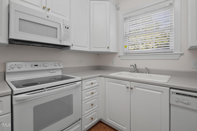 108-203 Northbrook Dr Unit 203, Raleigh, NC 27609 - kitchen featuring white appliances, white cabinetry, and light countertops