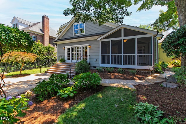 2707 Anderson Dr, Raleigh, NC 27608 - back of property with a sunroom and crawl space
