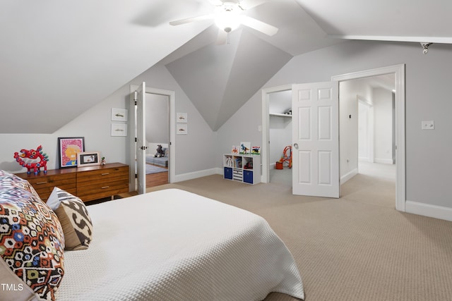 2707 Anderson Dr, Raleigh, NC 27608 - bedroom with vaulted ceiling, ceiling fan, and light carpet