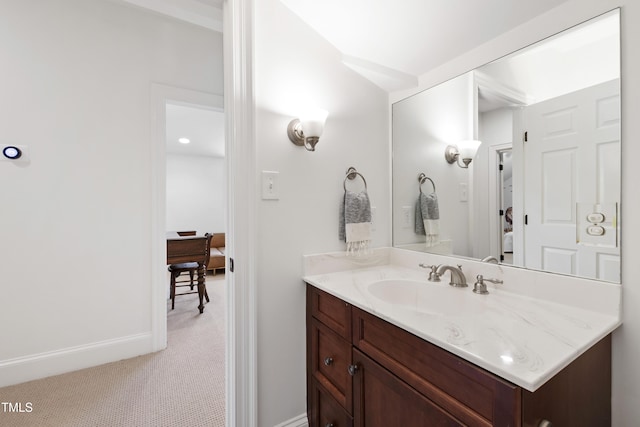 2707 Anderson Dr, Raleigh, NC 27608 - bathroom with vanity and baseboards