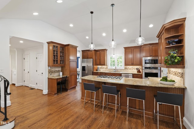 2707 Anderson Dr, Raleigh, NC 27608 - kitchen featuring stainless steel appliances, lofted ceiling, a peninsula, open shelves, and wood finished floors
