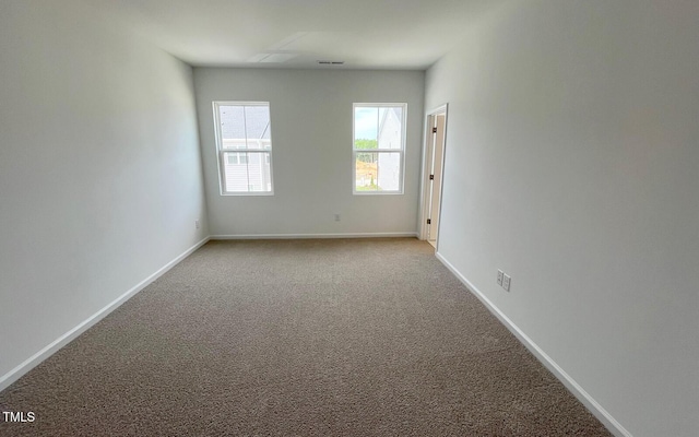 1559 Wendell Valley Blvd, Wendell, NC 27591 - carpeted empty room featuring baseboards