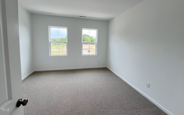 1559 Wendell Valley Blvd, Wendell, NC 27591 - carpeted spare room featuring baseboards