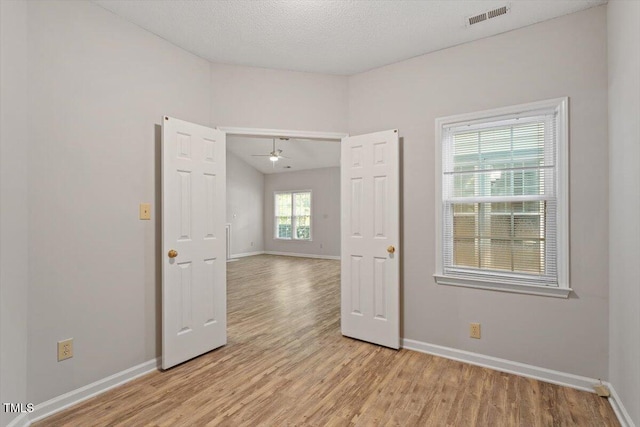 108 Ellsworth Pl, Cary, NC 27511 - unfurnished room with light wood finished floors and ceiling fan