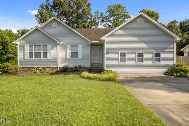 1401 Burchcrest Dr, Garner, NC 27529 - ranch-style home with a front yard, roof with shingles, and driveway