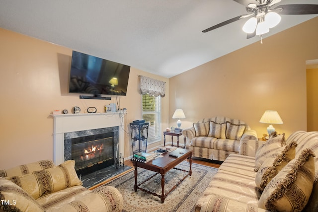 1401 Burchcrest Dr, Garner, NC 27529 - living room with a premium fireplace, a ceiling fan, wood finished floors, and vaulted ceiling