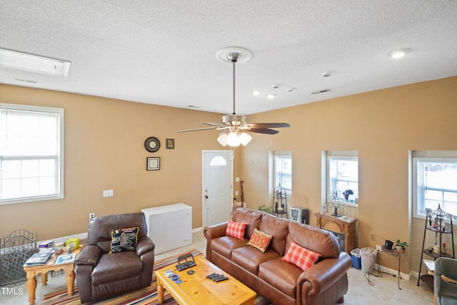 1401 Burchcrest Dr, Garner, NC 27529 - living room with ceiling fan, a textured ceiling, and recessed lighting