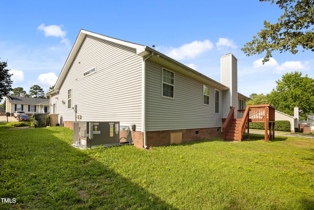 1401 Burchcrest Dr, Garner, NC 27529 - view of side of home featuring stairs, a yard, a deck, and a chimney
