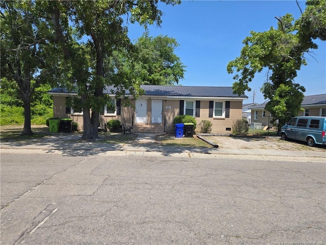 703 Lake Ave, Spring Lake, NC 28390 - ranch-style home with a metal roof and crawl space