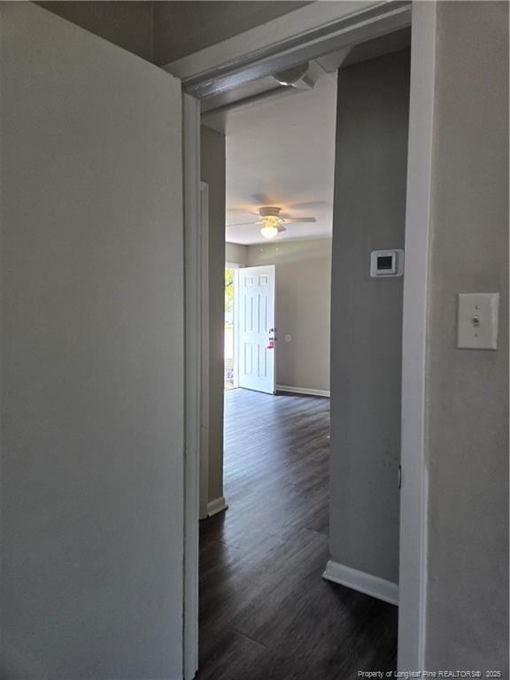 703 Lake Ave, Spring Lake, NC 28390 - hall featuring baseboards and dark wood-style floors