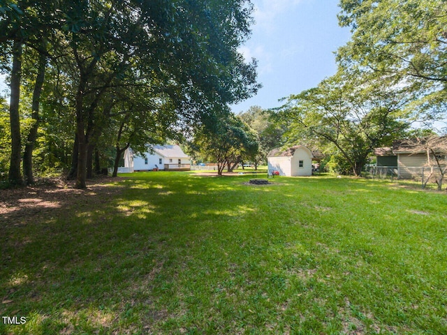 6020 Wildorlyn Cir, Raleigh, NC 27603 - view of yard with a storage shed