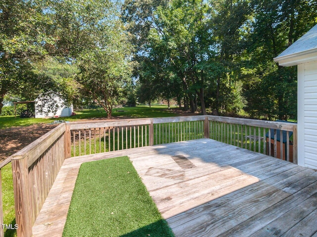 6020 Wildorlyn Cir, Raleigh, NC 27603 - wooden deck with a yard and a shed