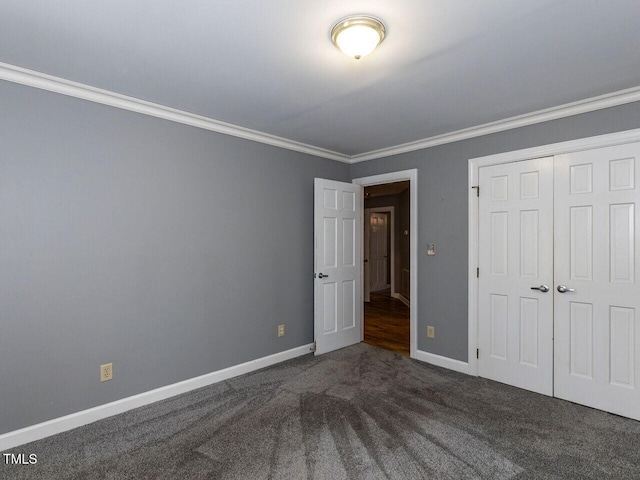 6020 Wildorlyn Cir, Raleigh, NC 27603 - unfurnished bedroom with crown molding, carpet floors, and a closet