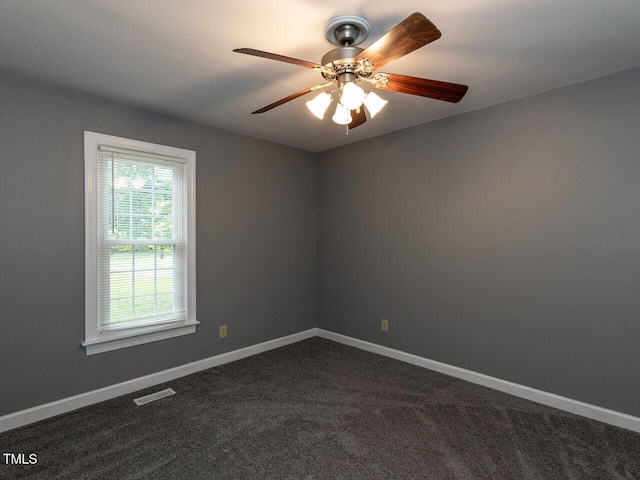 6020 Wildorlyn Cir, Raleigh, NC 27603 - empty room featuring dark carpet and a ceiling fan