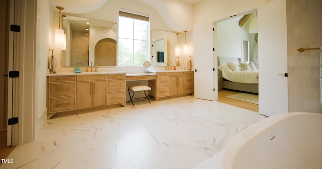 1620 Hunting Ridge Rd, Raleigh, NC 27615 - ensuite bathroom with marble tiled floors, a freestanding tub, vanity, and a shower
