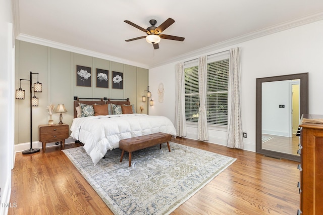 254 Charter Ct SE, Concord, NC 28025 - bedroom with crown molding, light wood-style floors, and a ceiling fan
