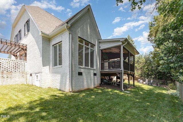 254 Charter Ct SE, Concord, NC 28025 - view of property exterior featuring a sunroom, brick siding, a fenced backyard, a shingled roof, and a pergola