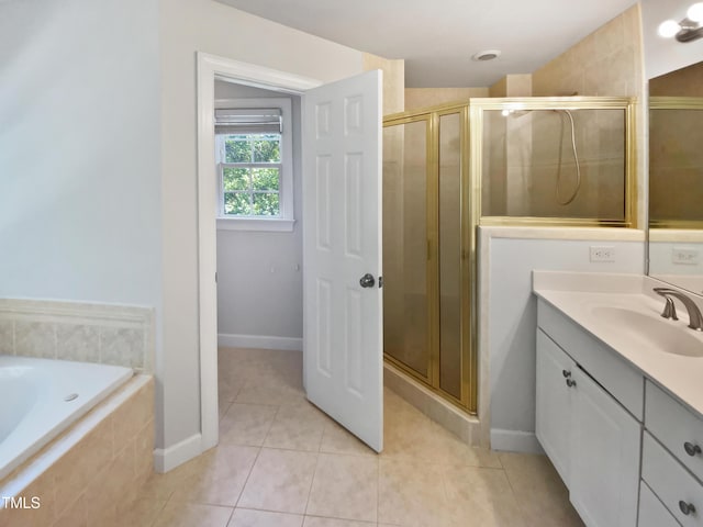 2408 Tiltonshire Ln, Apex, NC 27539 - bathroom with vanity, tile patterned floors, a stall shower, and a bath