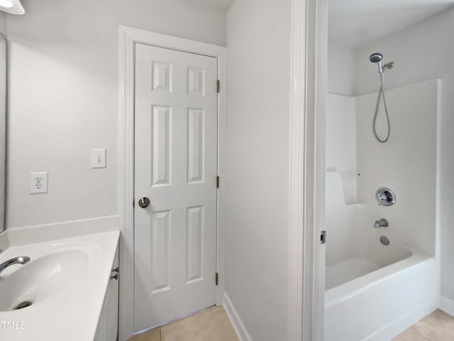2408 Tiltonshire Ln, Apex, NC 27539 - bathroom featuring washtub / shower combination, vanity, and tile patterned flooring