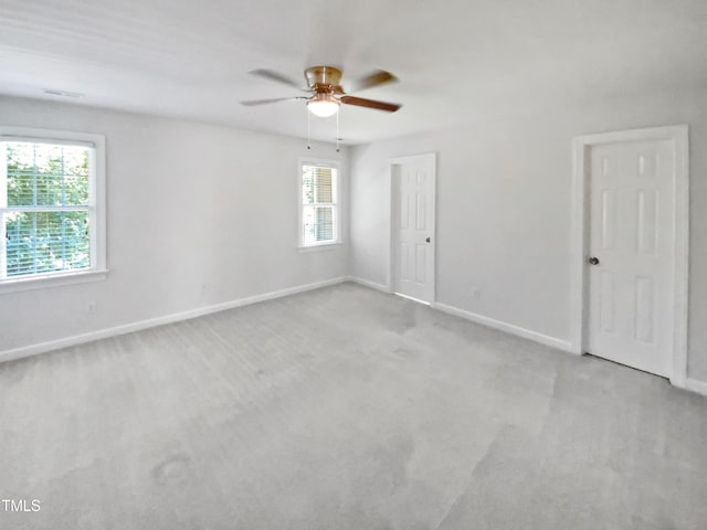 2408 Tiltonshire Ln, Apex, NC 27539 - carpeted spare room with a ceiling fan and baseboards