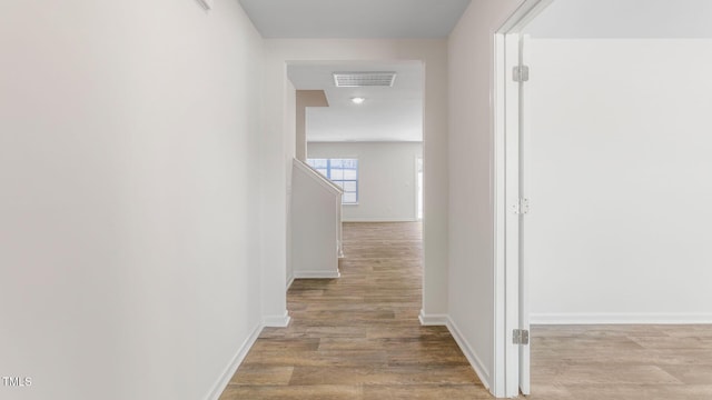 120 Leven Dr, Gibsonville, NC 27249 - corridor featuring wood finished floors and baseboards