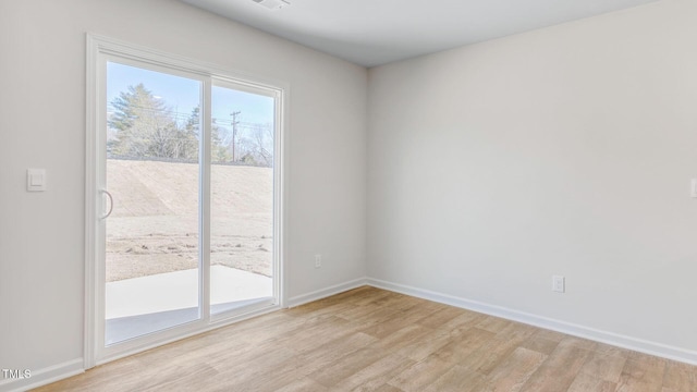 120 Leven Dr, Gibsonville, NC 27249 - unfurnished room featuring light wood-style floors and baseboards