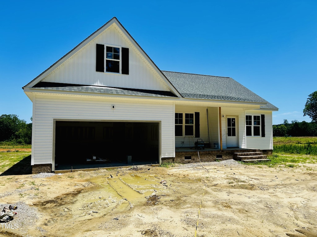 6750 Fire Tower Rd, Bailey, NC 27807 - view of front of home featuring a porch and roof with shingles