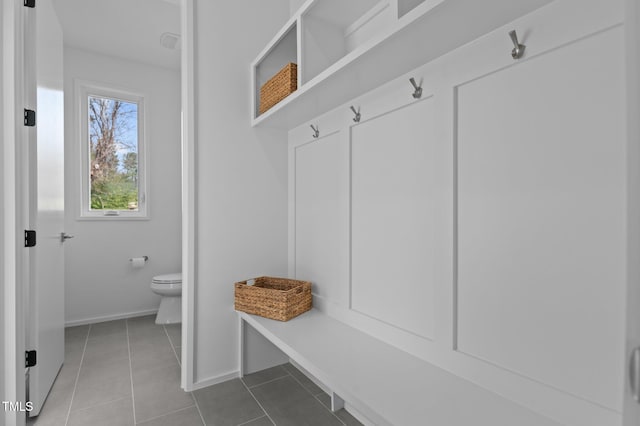505 Colleton Rd, Raleigh, NC 27610 - mudroom featuring tile patterned flooring and baseboards