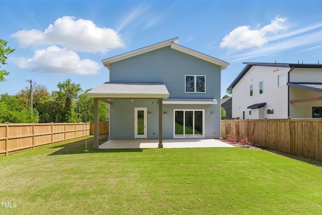 505 Colleton Rd, Raleigh, NC 27610 - back of property with a patio, a fenced backyard, and roof with shingles