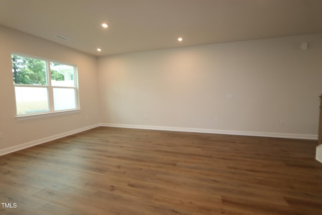 912 Montague Ave, Durham, NC 27703 - unfurnished room featuring wood finished floors and recessed lighting