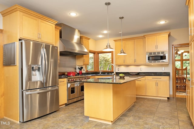267 Bald Eagle Dr, Pittsboro, NC 27312 - kitchen featuring appliances with stainless steel finishes, wall chimney exhaust hood, light brown cabinetry, a kitchen island with sink, and recessed lighting