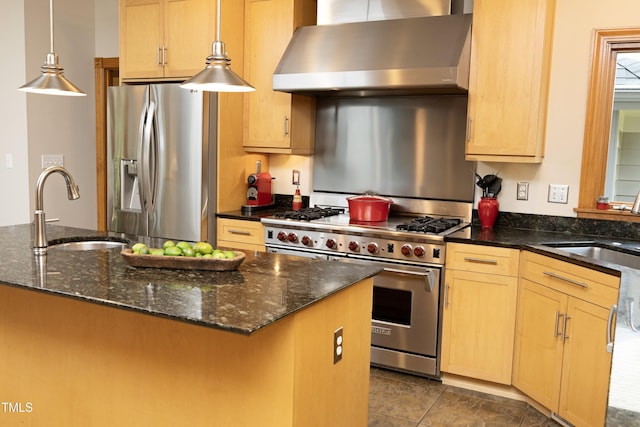 267 Bald Eagle Dr, Pittsboro, NC 27312 - kitchen featuring stainless steel appliances, wall chimney range hood, pendant lighting, dark stone counters, and light brown cabinetry