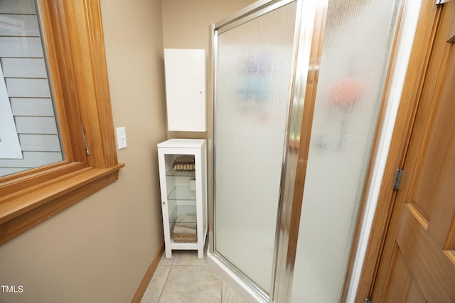 267 Bald Eagle Dr, Pittsboro, NC 27312 - bathroom with a stall shower and tile patterned flooring