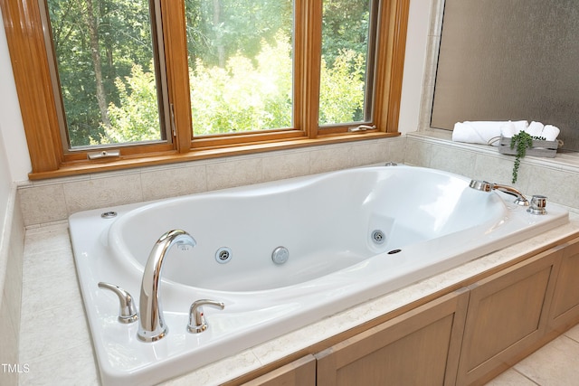 267 Bald Eagle Dr, Pittsboro, NC 27312 - full bath with plenty of natural light, a tub with jets, and tile patterned floors